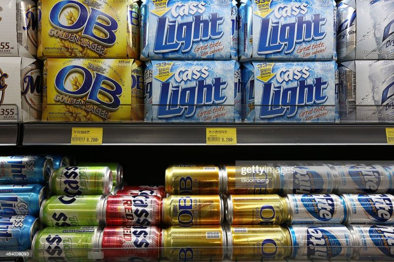 Cases and cans of Oriental Brewery Co. OB Golden Lager and Cass beers are displayed for sale at a supermarket in Incheon, South Korea, on Monday, Jan. 20, 2014. Anheuser-Busch InBev NV agreed to pay $5.8 billion for South Koreas Oriental Brewery, regaining control of a company that became the Asian nations biggest brewer under KKR &amp; Co. and Affinity Equity Partners Ltd. Photographer: SeongJoon Cho/Bloomberg via Getty Images